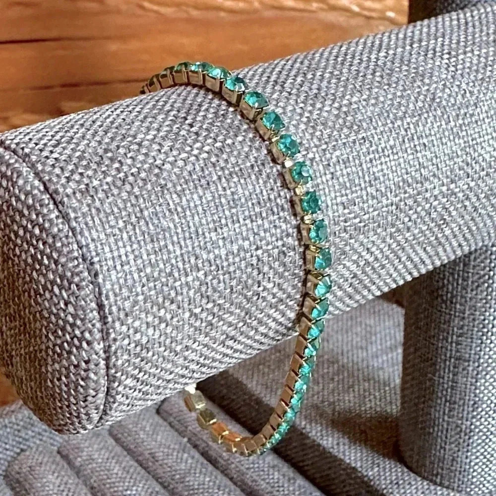 Gold Tennis Bracelet with Emerald Green Stones